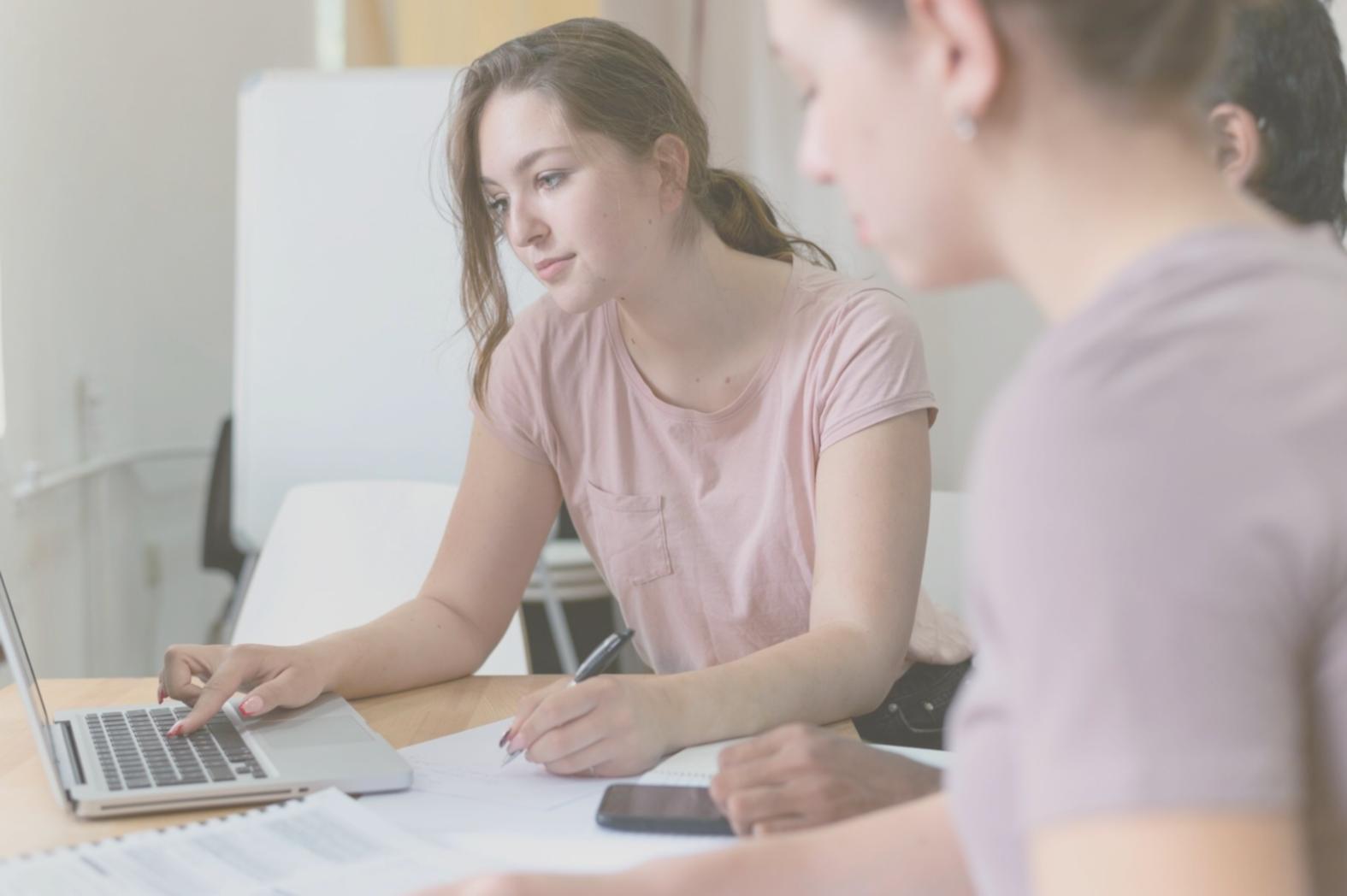 Professional reviewing financial documents and negotiation strategies